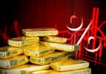precio del oro cae, tasas de interés suben