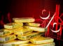 precio del oro cae, tasas de interés suben